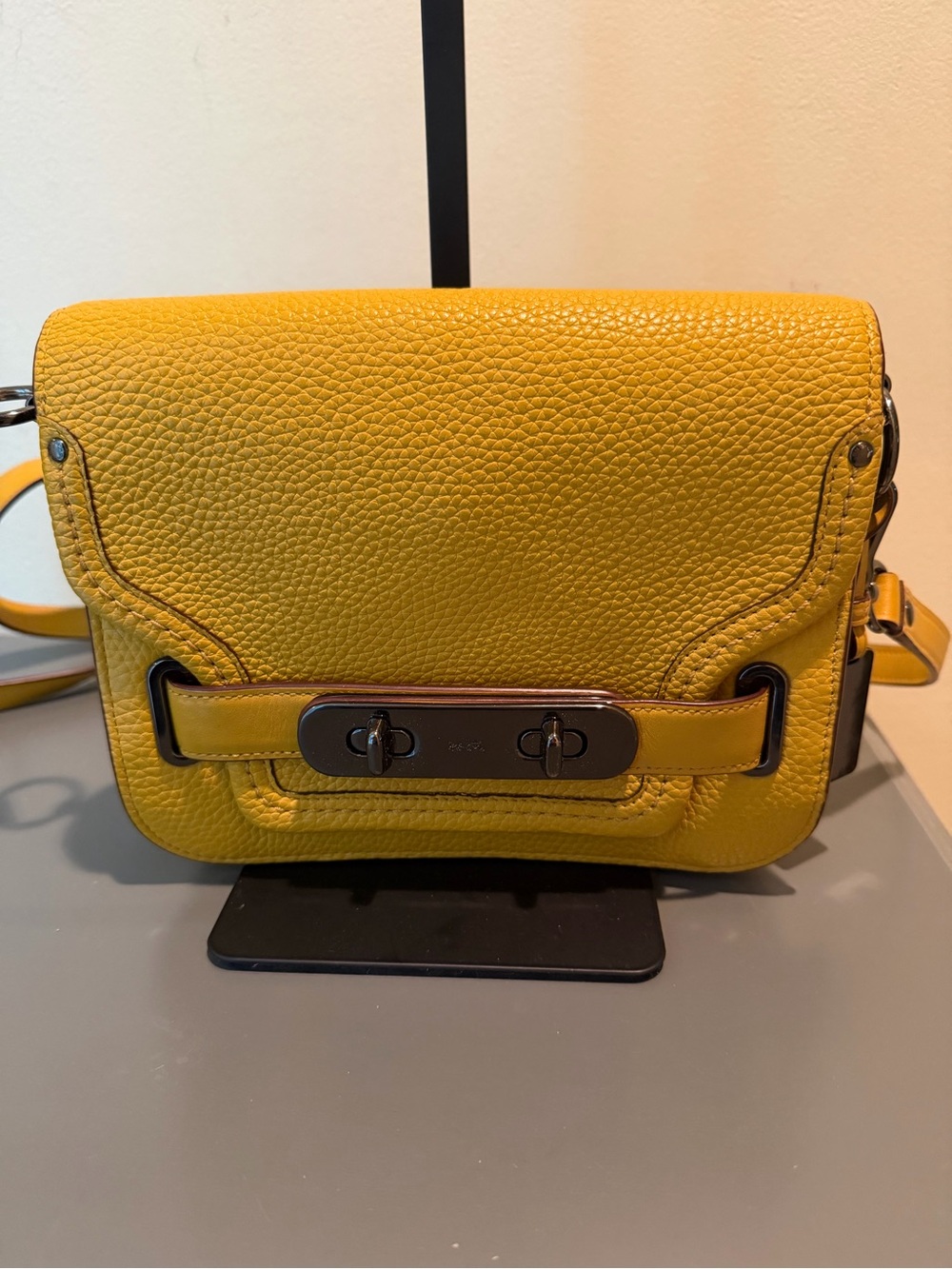 Coach Swagger pebbled leather crossbody in Mustard Yellow